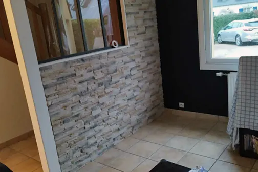 Pose carrelage salon